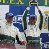 Rickard Rydell, David Brabham and Darren Turner on the podium after winning the GT1 class at Le Mans 2007